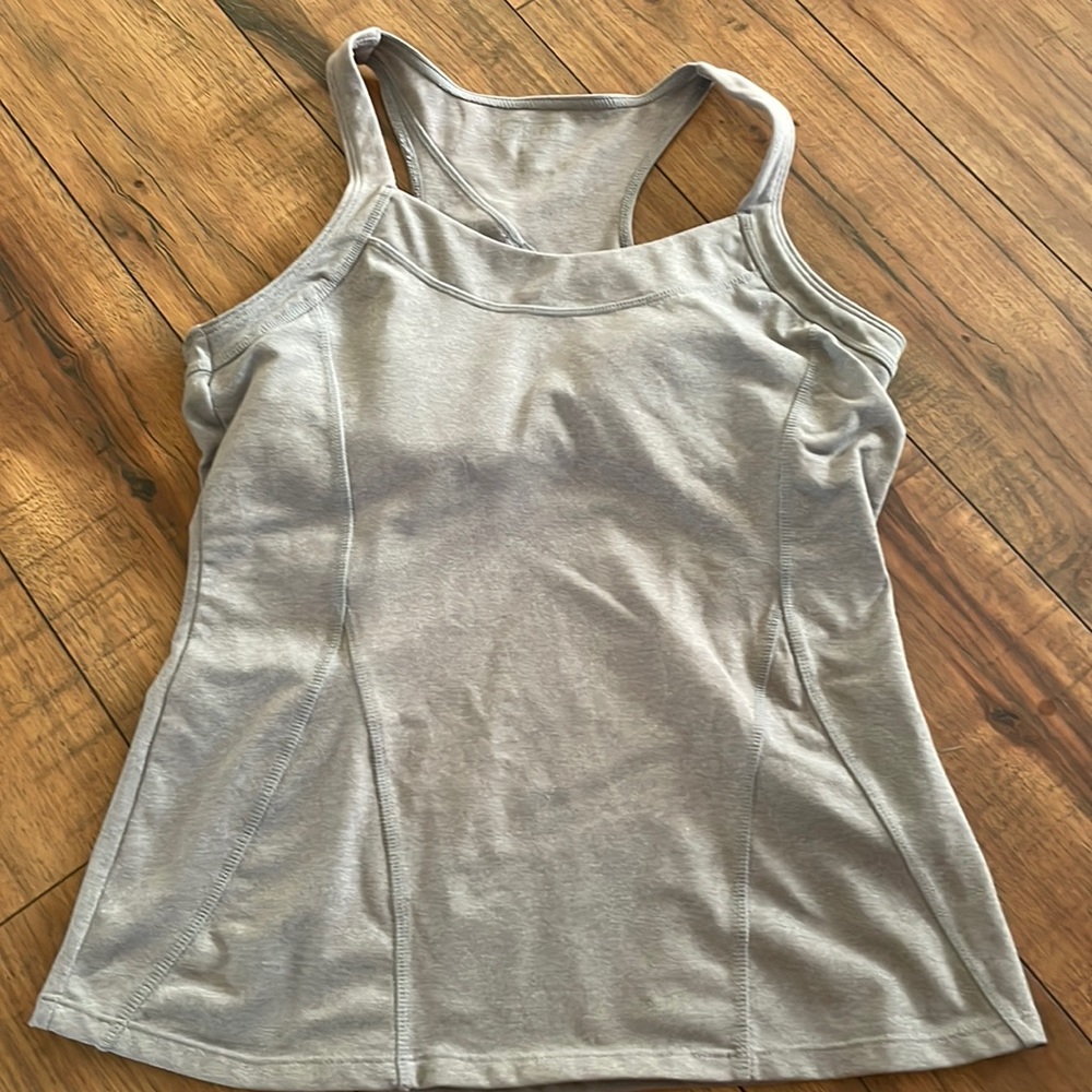 Gently used Athleta  work out tank. Has built in bra.